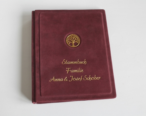 Stammbuch "Goldene Lebensbaum" aus weinrotem Samtleder,  DIN A5